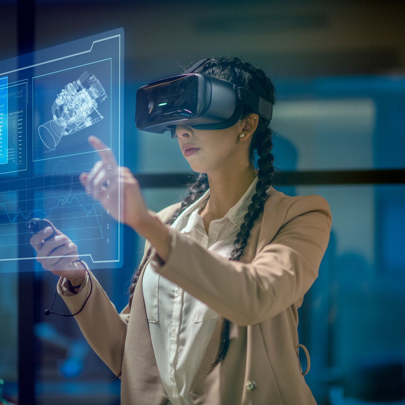 Female engineer wearing a virtual reality headset at work to explore an upcoming mechanical engineering project