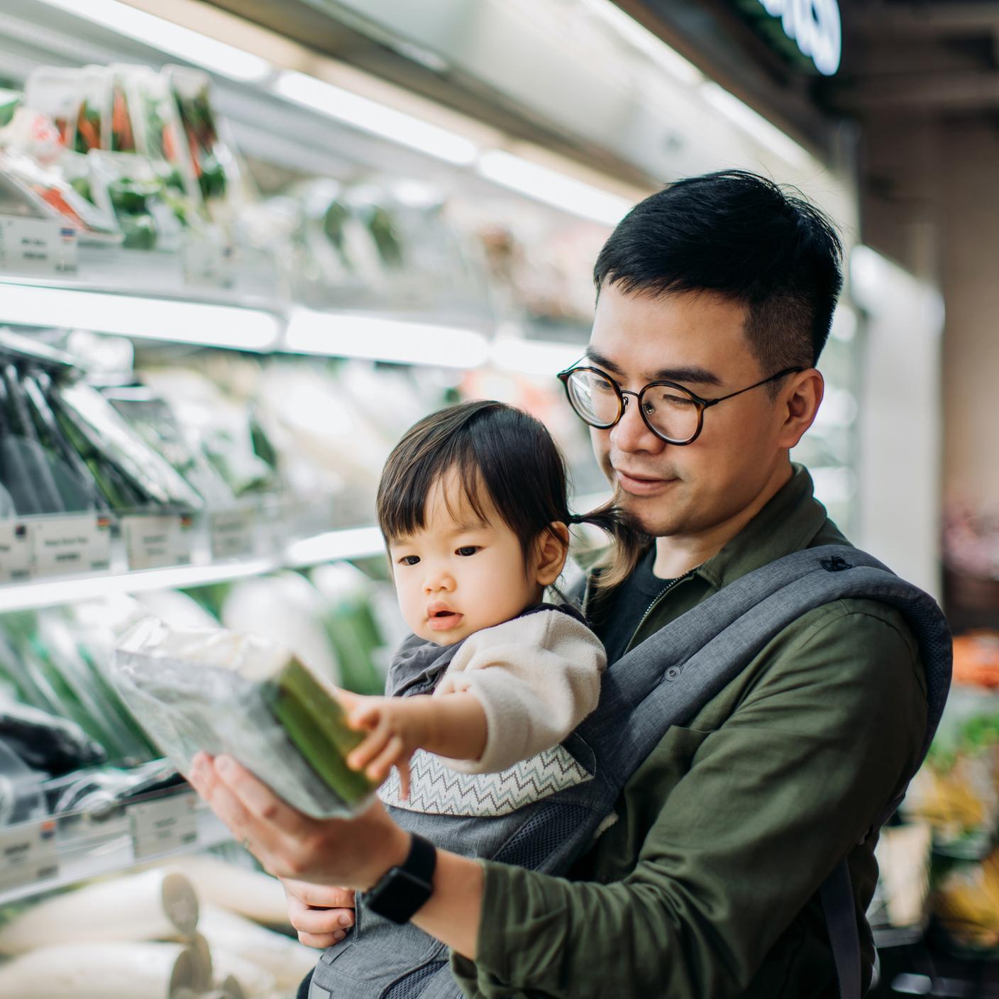 A father and his son in a supermarket