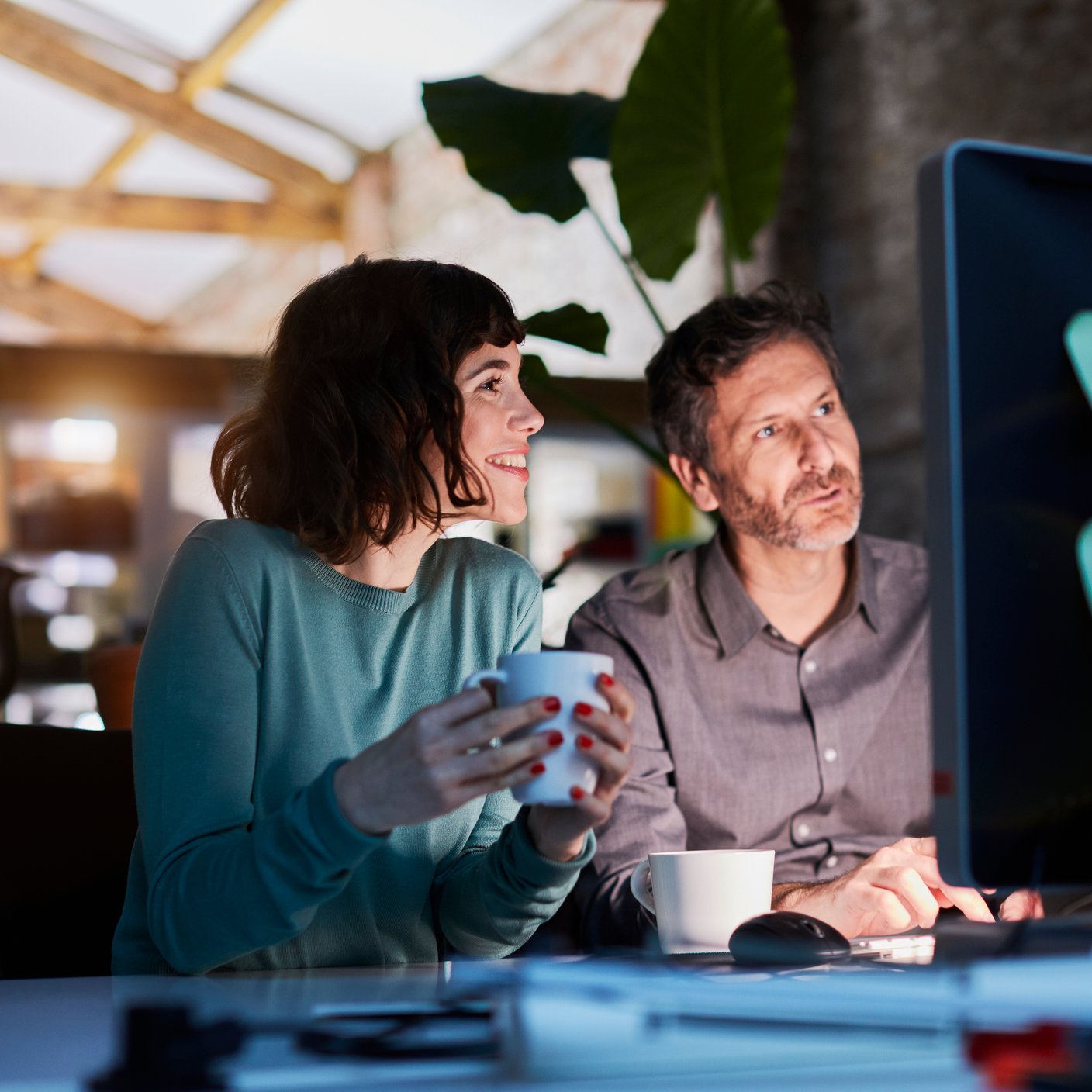 Man and woman at laptop
