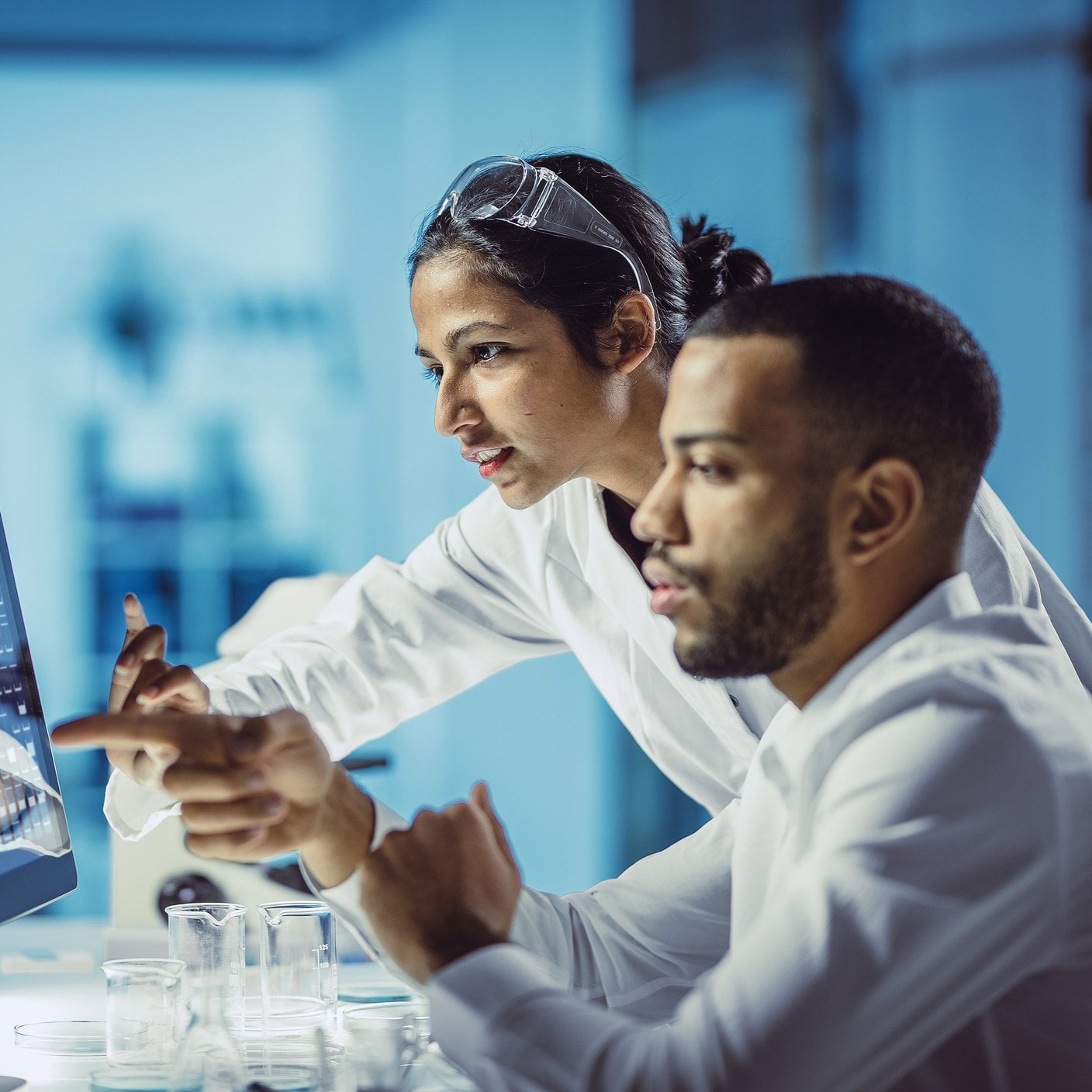 2 people working in a Lab 