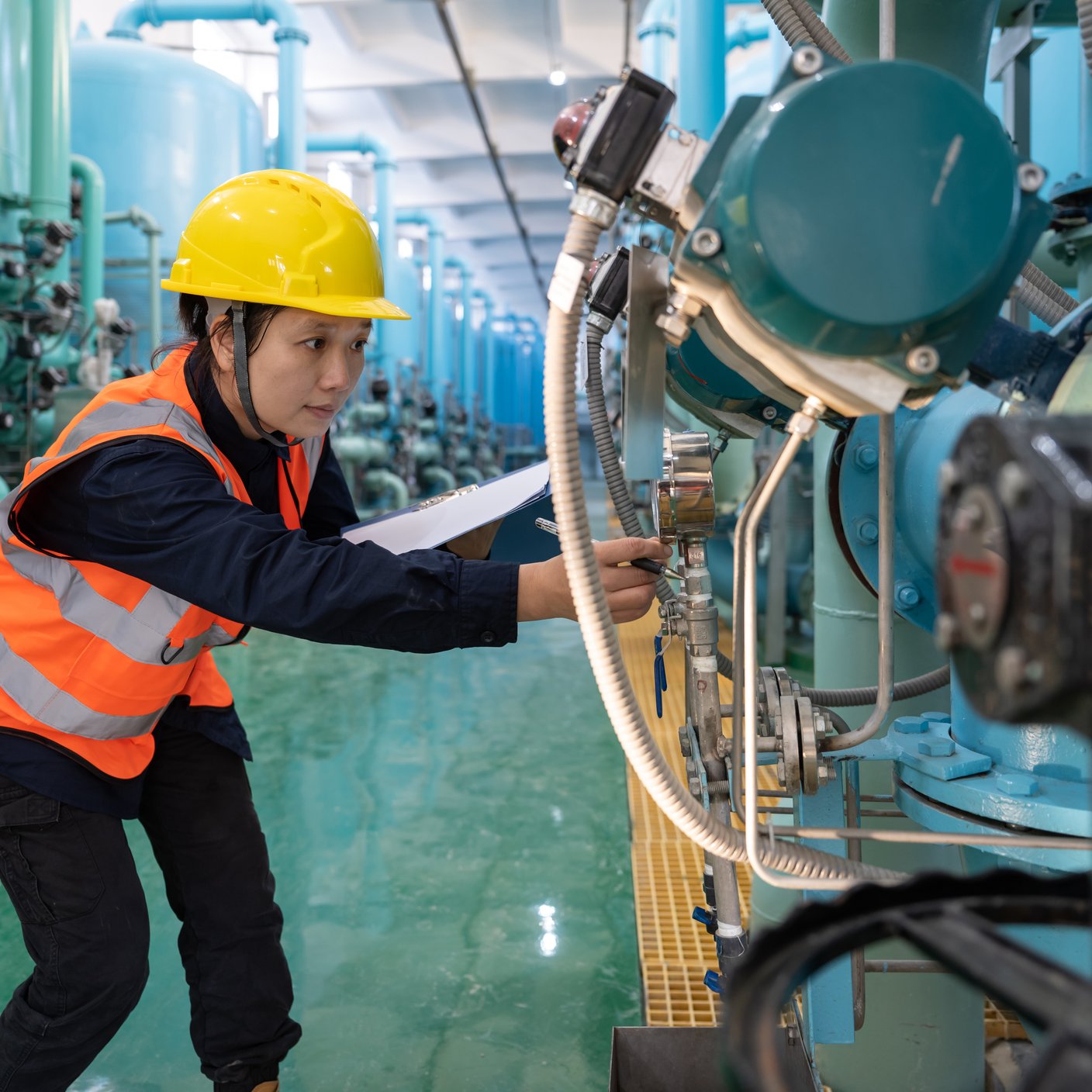 Women wearing PPE in factory 
