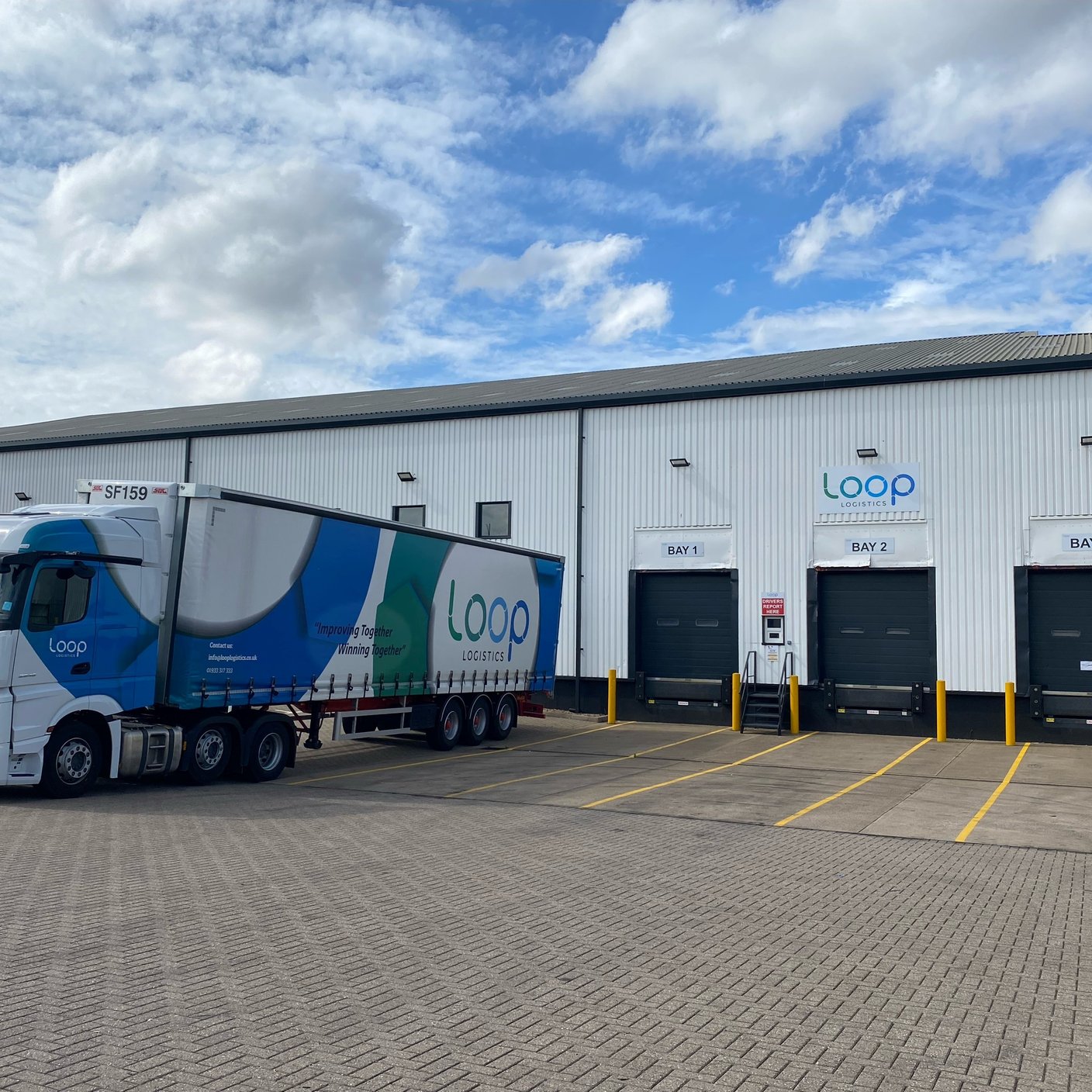 Loop logistics lorry at docking bay