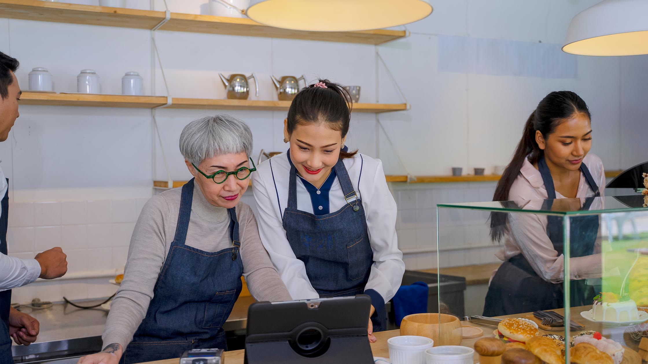 people working in a kitchen