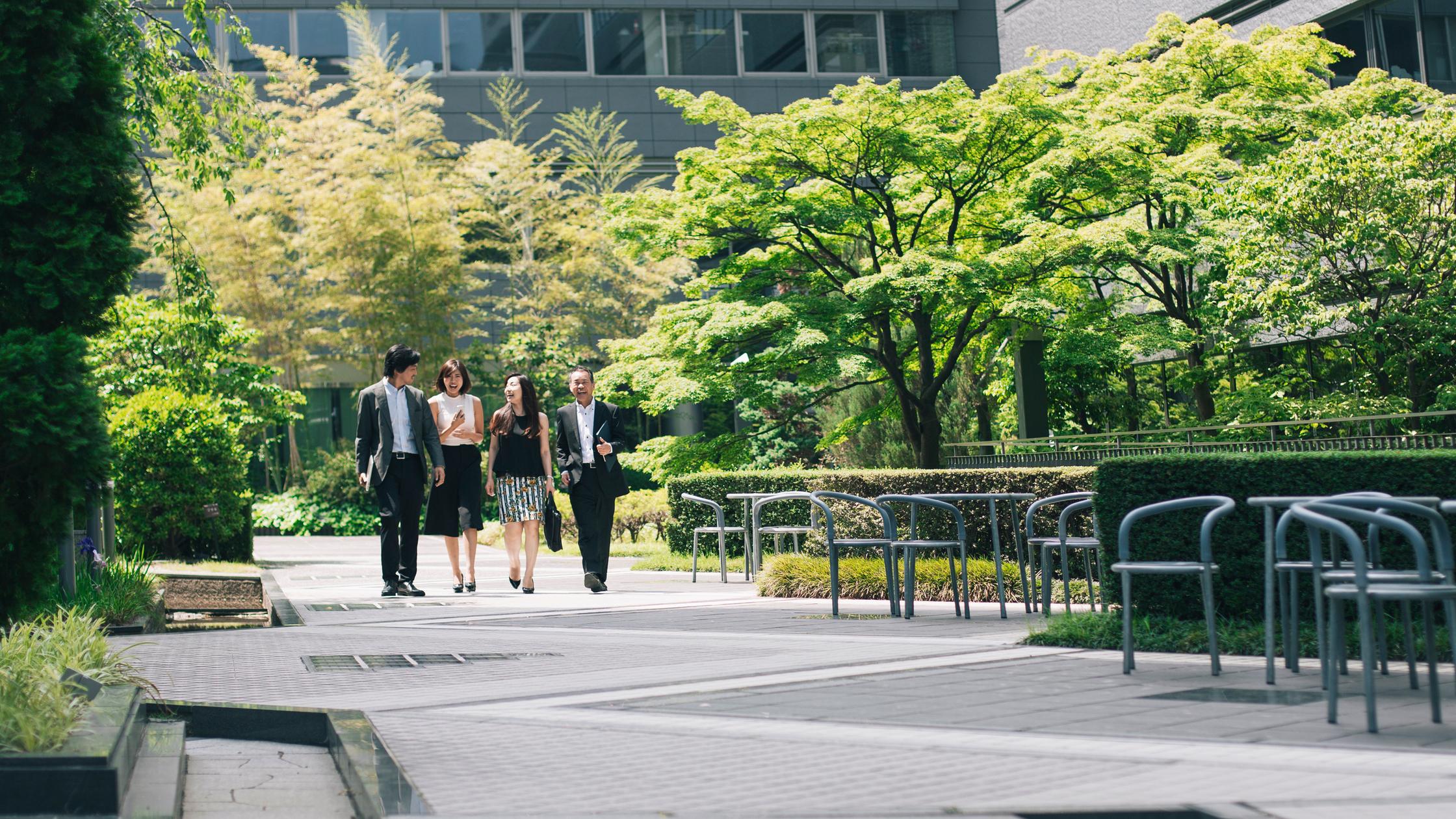 collegues on green path